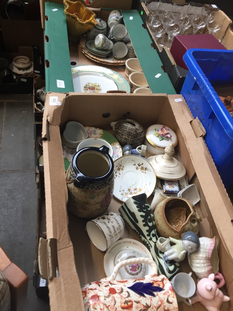 Two boxes of assorted pottery.