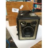 A Brownie Six-20 Model D camera in wooden case