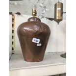 A copper lamp base