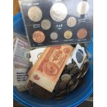 Box of world coins and banknotes