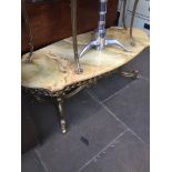 An Italian vintage onyx top coffee table with gilt metal base.