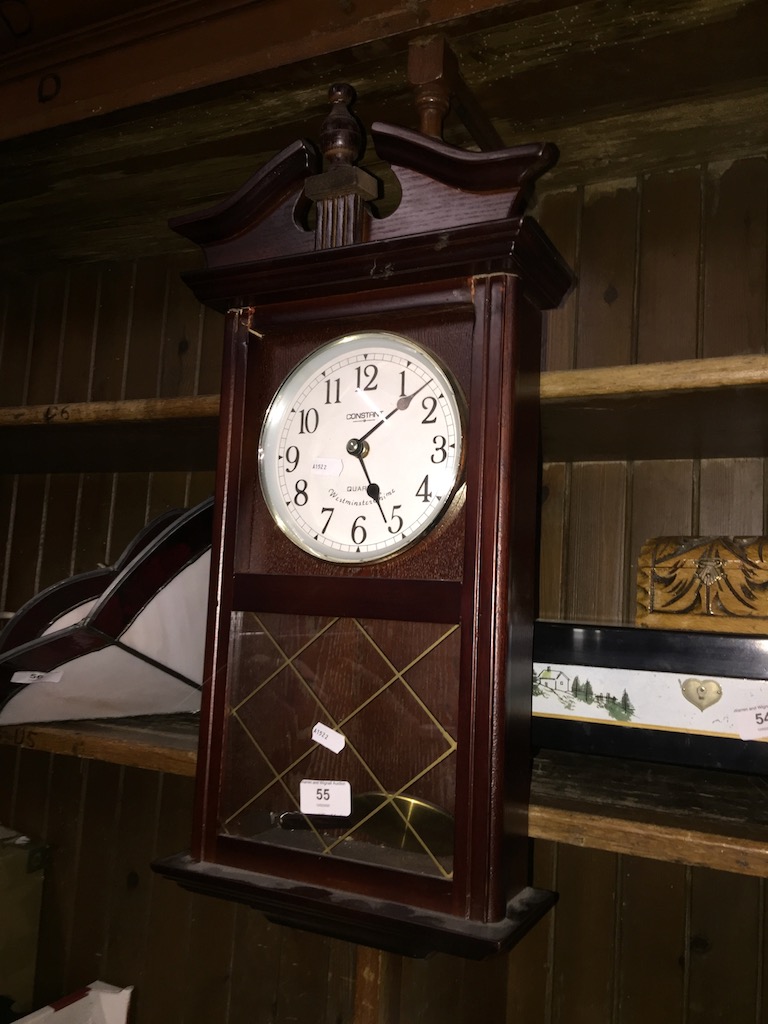 A Constant quartz Westminster chime wall clock.