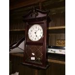 A Constant quartz Westminster chime wall clock.