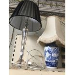 Perspex table lamp and a blue and white ceramic lamp