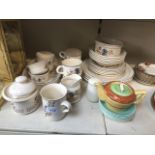 A Boots Carmargue dinner service and few Poole saucers + tea pot.