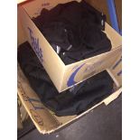 A box of bags, holdalls, etc and a box of cycling apparel.