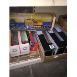 A quantity of boxed model trucks - Kenworth, Cararama, etc - 2 boxes.