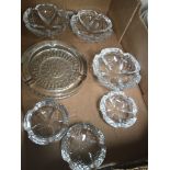 6 matching heavy glass ashtrays and one other