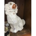 A Staffordshire pot dog.