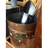 A large copper bucket, coal hod and walking sticks