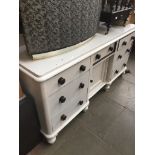 A painted Victorian pine sideboard.