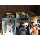 A group of six Meerkat soft toys.