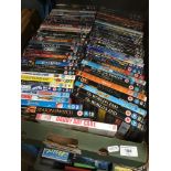 A box containing approx. 64 DVDs.