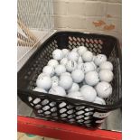 A tub of golf balls