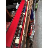 A 4 piece Riley snooker cue in case