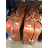 Two suitcases containing Millers antique guides - approx 24