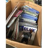 A box of mainly Everton FC football programmes