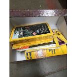 A box of National Geographic magazines and road maps