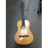 An Encore acoustic guitar