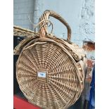 A wicker picnic hamper.