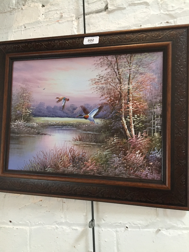 Ducks in flight, oil on canvas, indistinctly signed lower right, 39cm x 30cm, framed.