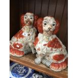 A pair of reproduction Staffodrshire dogs