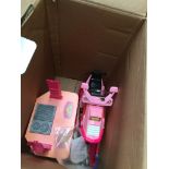 A box with a Barbie Kitchen and a Barbie scooter