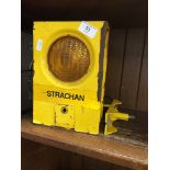 A yellow skip safety lamp