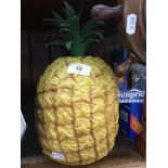 A pineapple ice bucket