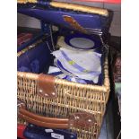 A wicker picnic trolley