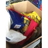 A box of misc, including lifeboat tabarts, mini ironing board etc