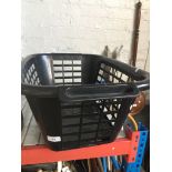 A plastic laundry basket