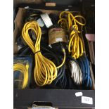 A box of various electric cables.