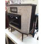 An Ace Radio retro radiogram with turntable on spindle legs