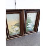A pair of prints, swans on a lake, 29cm x 59cm each, framed and glazed.