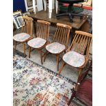 A set of four spindle back chairs