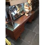 An Avalon teak dressing table