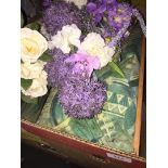 A box of bric-a-brac including artificial flowers, storage containers, etc.