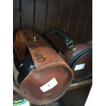 2 leather cases containing 2 sets of crown green bowls.