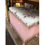A pink woven linen box