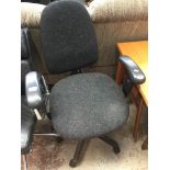 An adjustable office swivel chair
