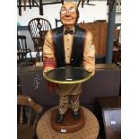 A waiter statue