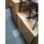 Three filing cabinets