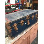 A vintage travel trunk full of vintage toys including Airfix, Triang, Meccano, Lego, etc