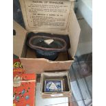 A respirator (gas mask) in original box and two vintage boxes of matches