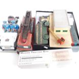 A quantity of model railway, a tin and wooden truck, a tin plated fire engine, police car etc.
