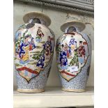 A pair of Japanese pottery vase. - one broken