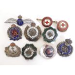 A mixed lot of badges comprising an RAF badge marked 'Silver', another marked 'Silver' and two