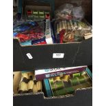 Two boxes of cotton reels and tapestry wool swatches