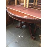 A mahogany pedestal dining table with 4 balloon back chairs